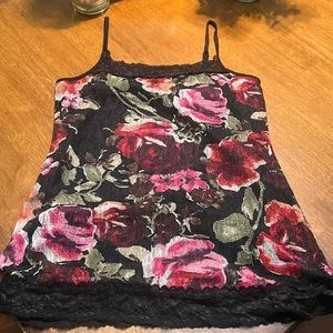 Beautiful black lace/floral tank top size Medium. Adjustable straps.